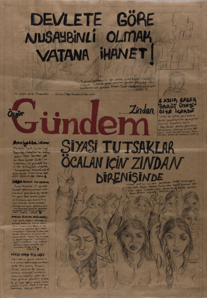 A photograph of the front page of Özgür Gündem Zindan newspaper, first edition.