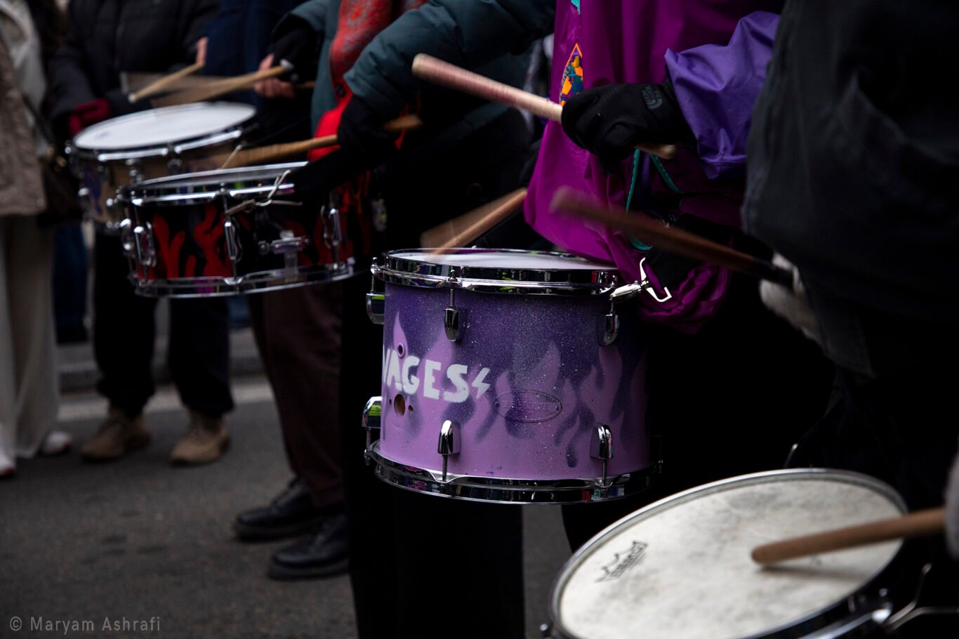 Drumming group performing in a protest.