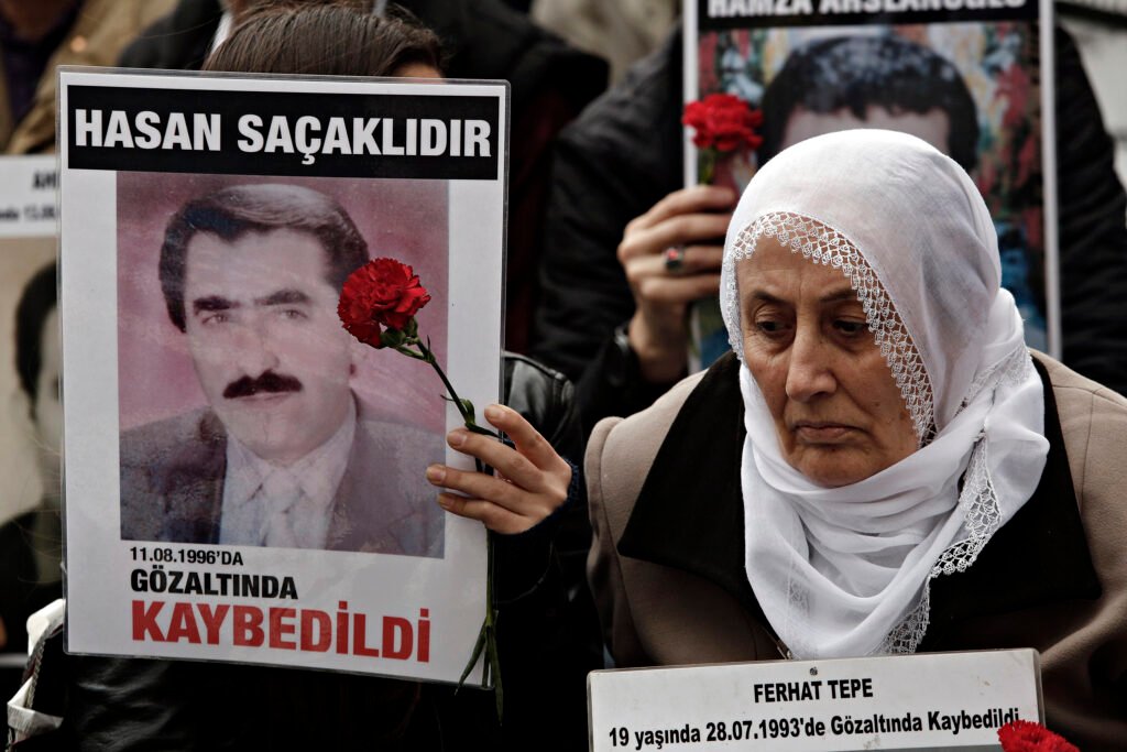 The Saturday Mothers showing pictures of imprisoned family members protest in Istanbul, Turkey.