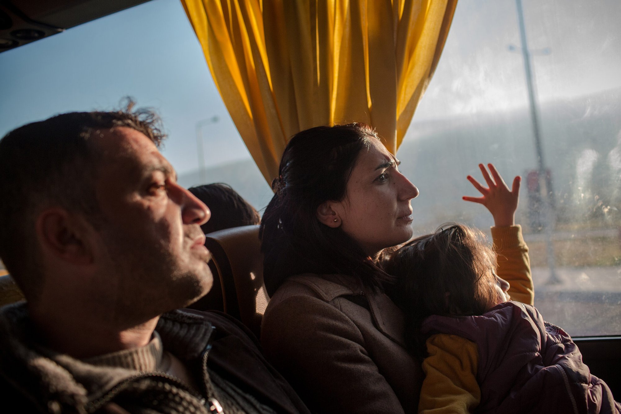 Syrian refugee family on a bus from Athens to Greek-Macedonian border.
