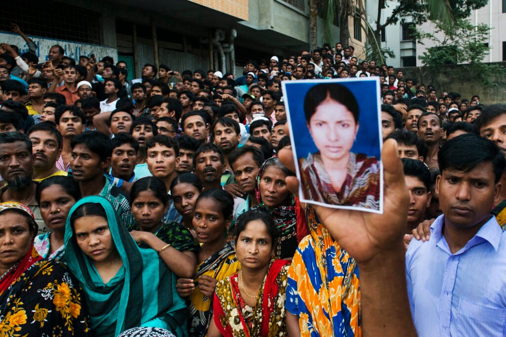 Families of missing loved ones at the Rana Plaza collapse site in Dhaka, Bangladesh.
