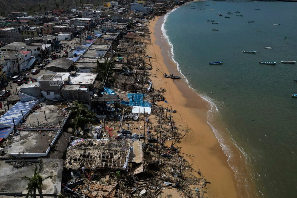 A drone image of the village of Puerto Marques, Guerrero, showing extensive damage after Hurricane Otis hit the coastal village.