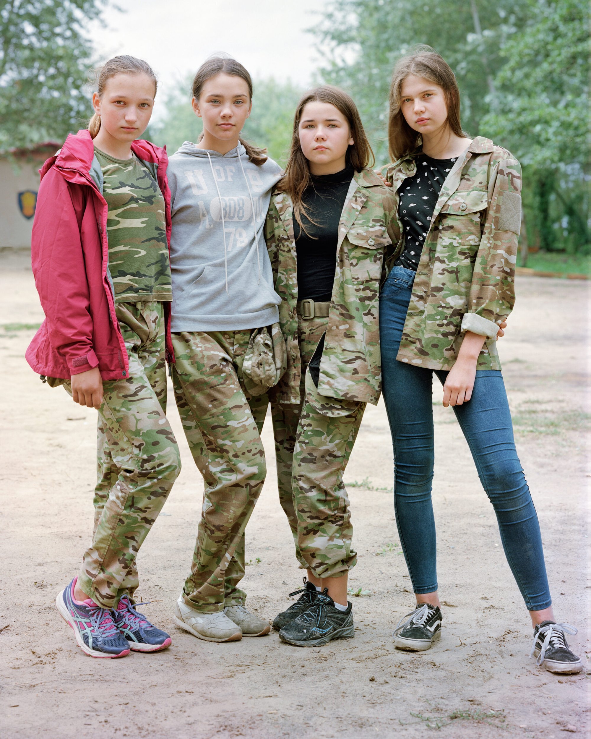 Teenage girls pose for a portrait at the Azovets summer camp.