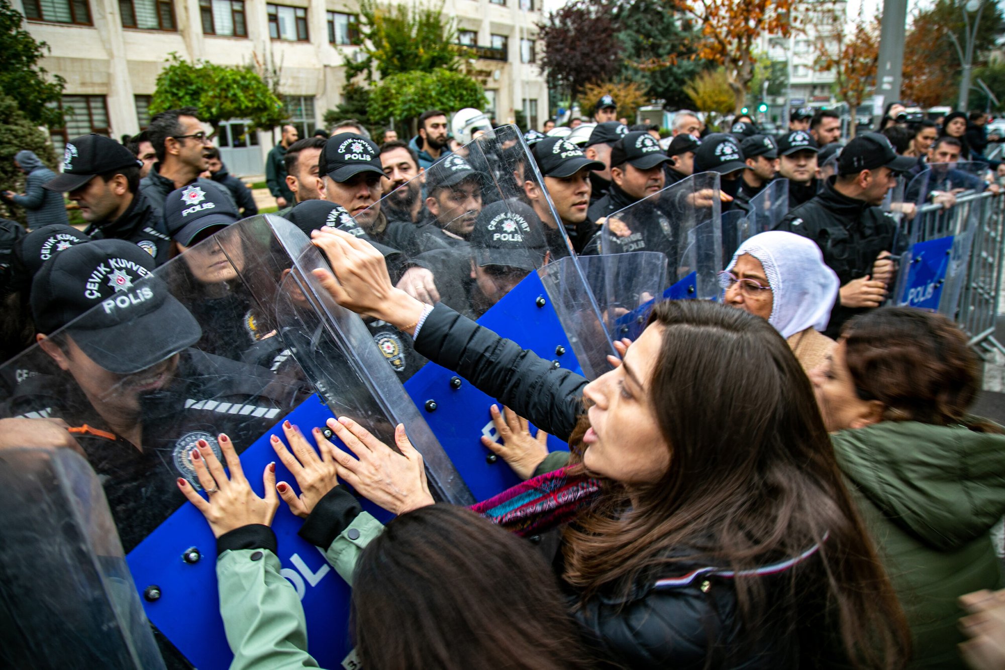 The mayor of Batman, Turkey, Gulistan Sonuk confronts police during protests.