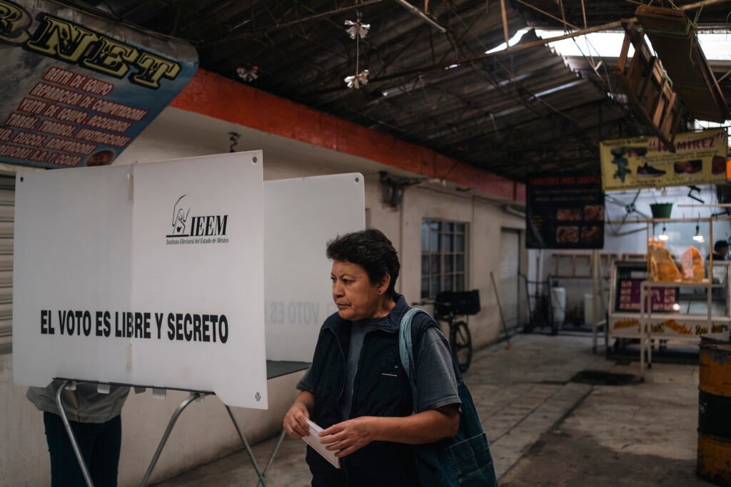 A woman casts her vote during the judicial election day on June 01, 2025 in Ecatepec, State of Mexico.