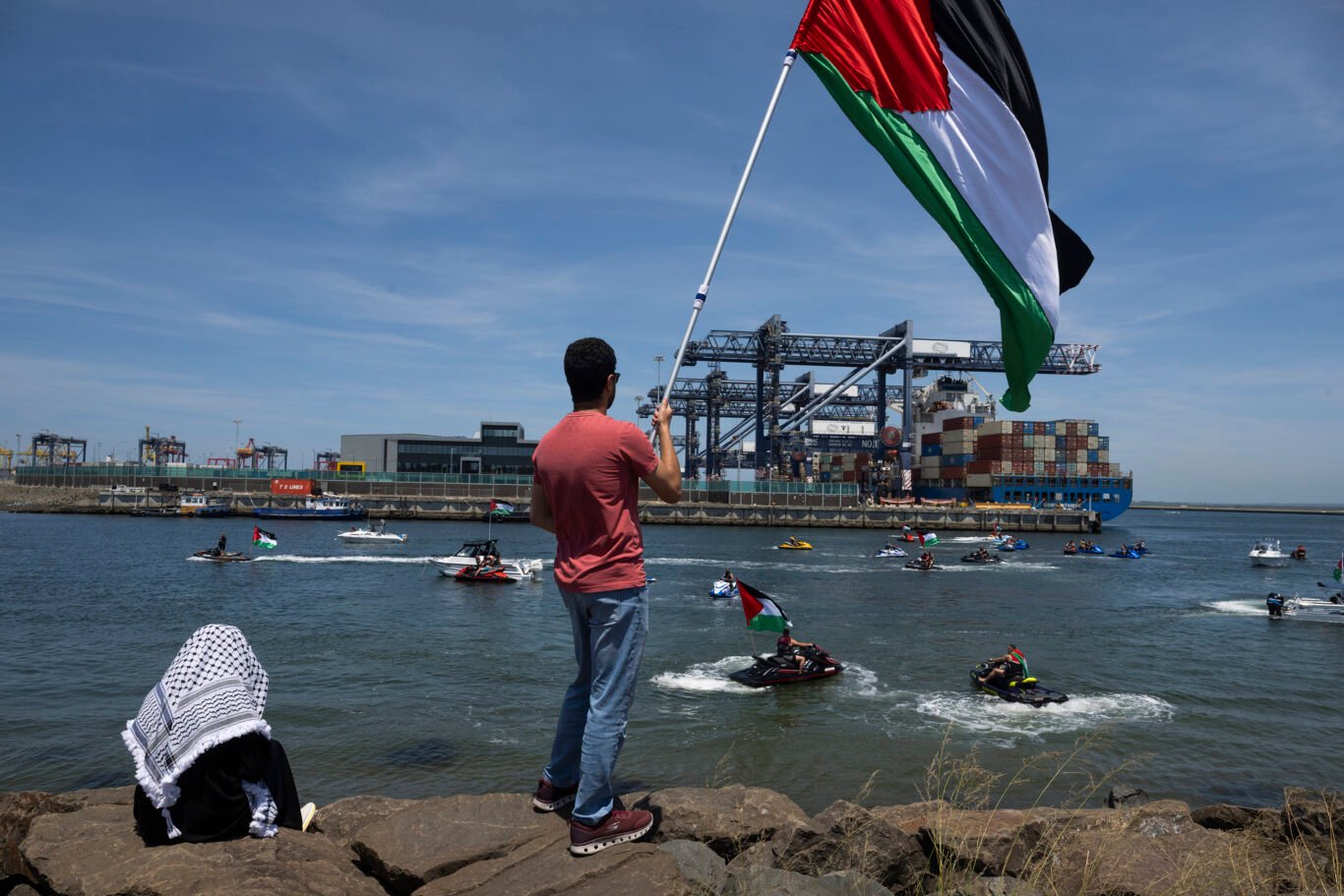 protesters formed a jetski blockade at Port Botany, Sydney, forcing Israeli shipping giant ZIM to abandon its planned docking.