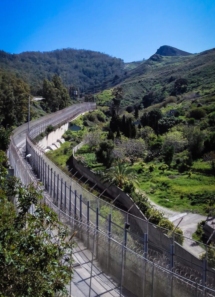 The Ceuta-Morocco border fence, as seen from the Ceuta side.