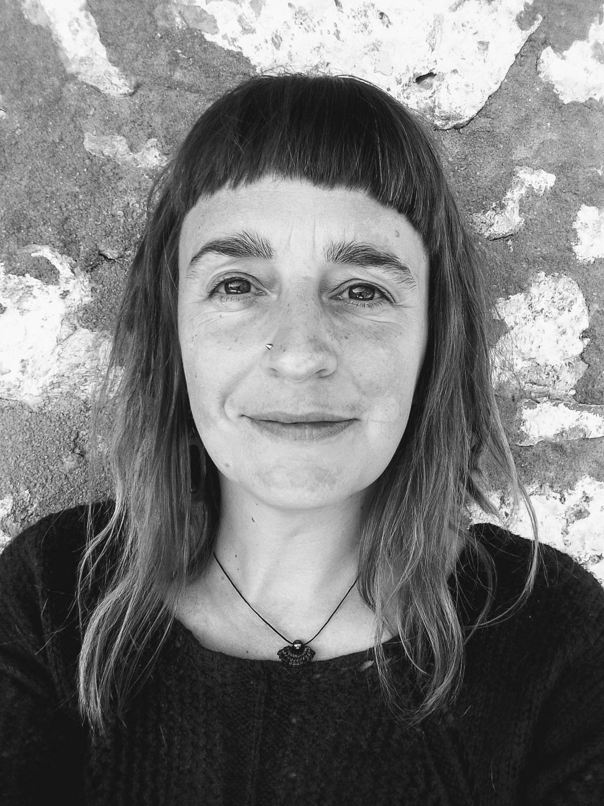 Author portrait of Emma Musty.