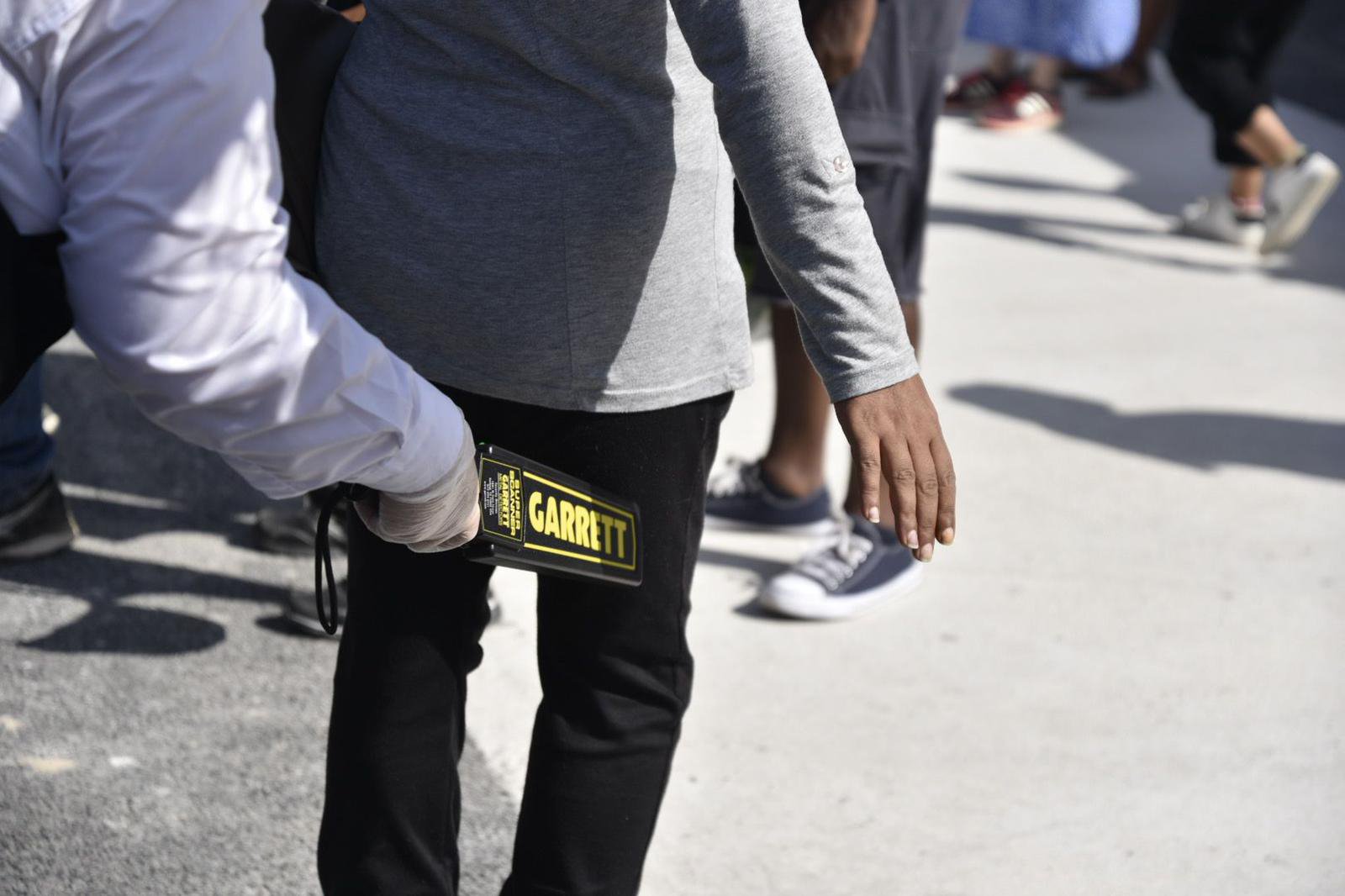 People are subject to security checks upon entrance, which can include bag checks and body searches.