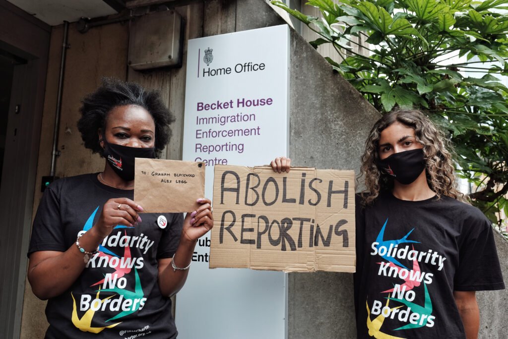 Organizers from Migrants Organise outside Becket House.