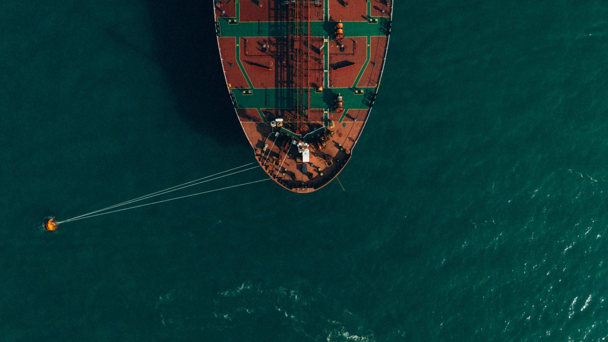 An anchored tanker ship pictured from above.